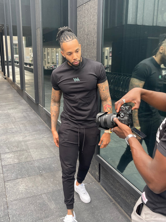 BLACK T-SHIRT W/ GREEN LOGO